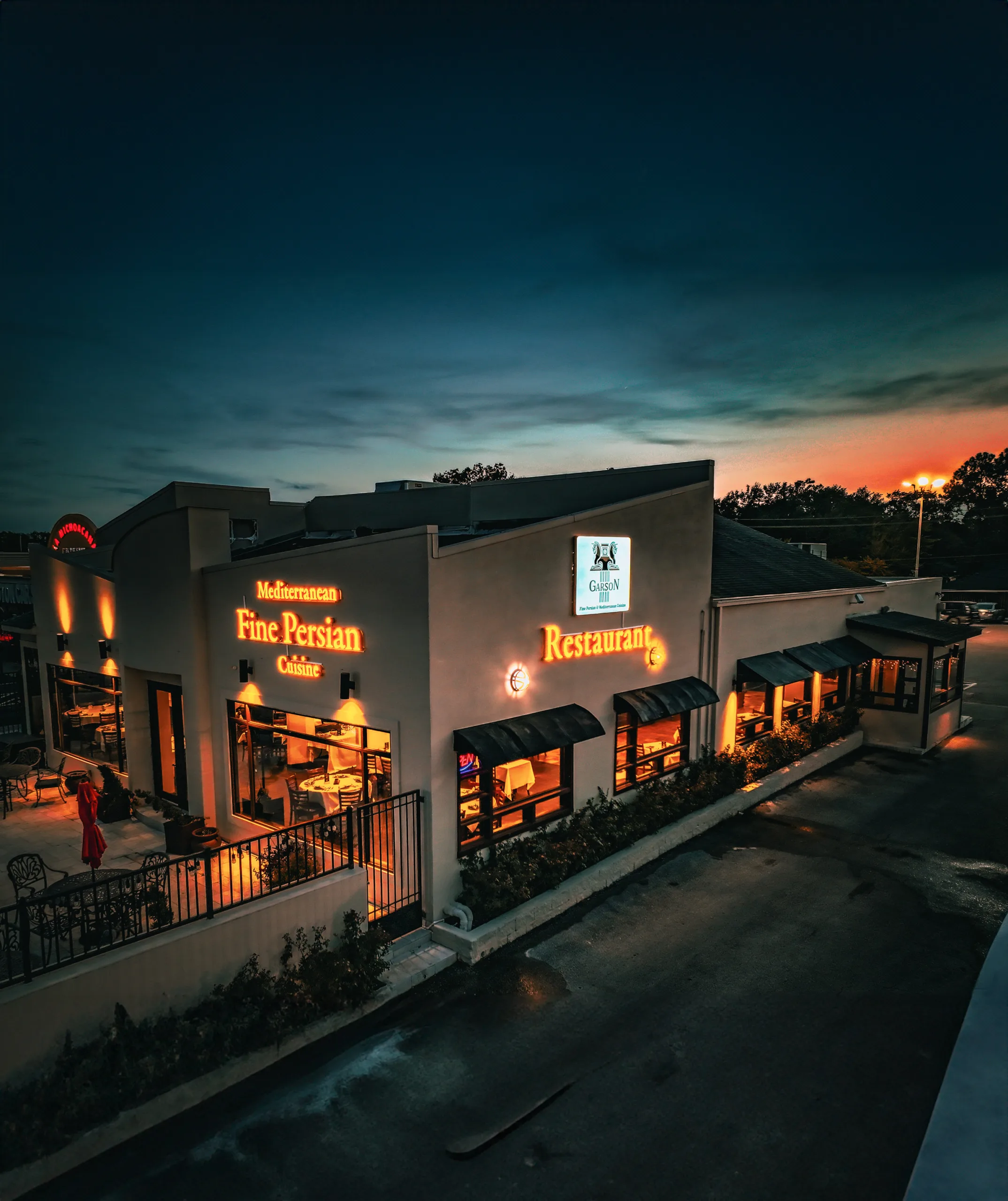 The exterior of the restaurant at night